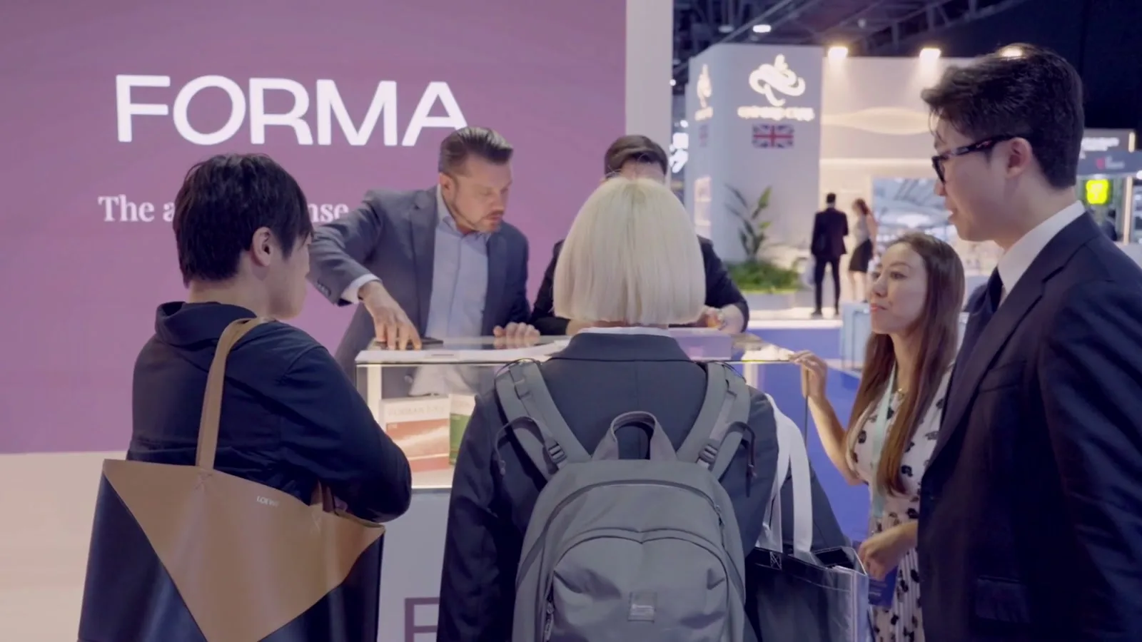 Clinicians at the FORMA counter