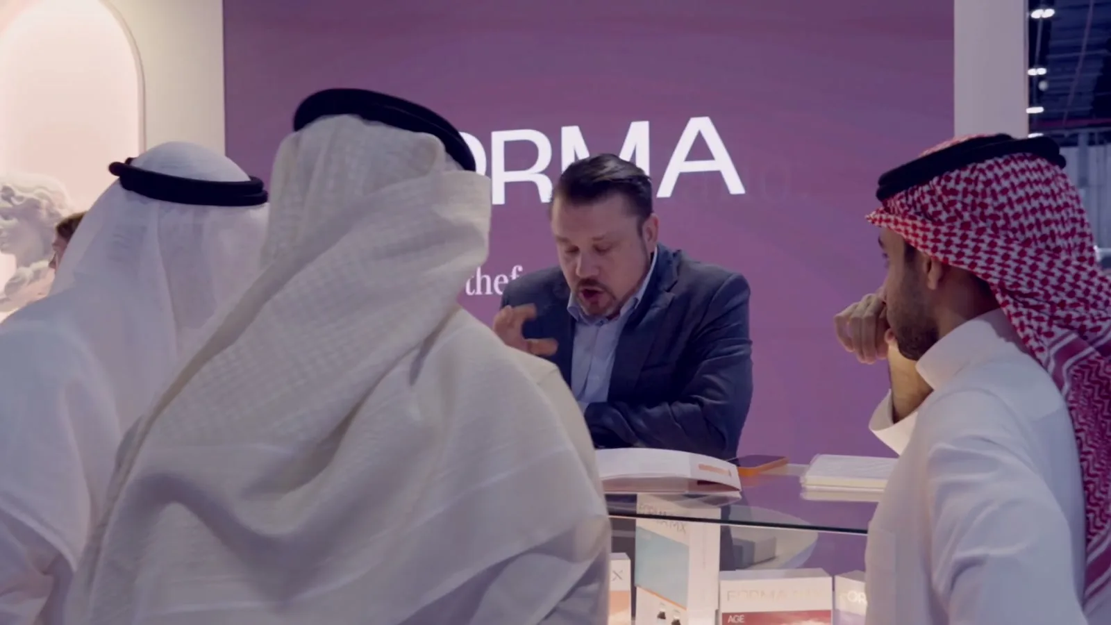 Visitors at the FORMA wall